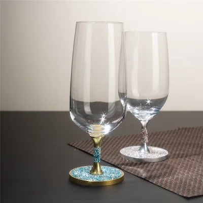 Two beer glasses with decorative crystal bases