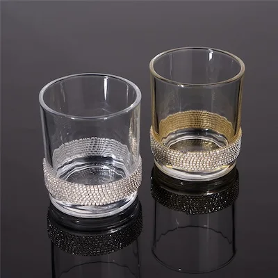 Two whiskey glasses with decorative bands